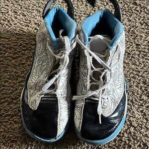 Jordan Black and Blue Sneakers Mid-Top Design